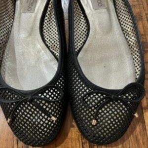Black lace Jimmy Choo flats with bow on front